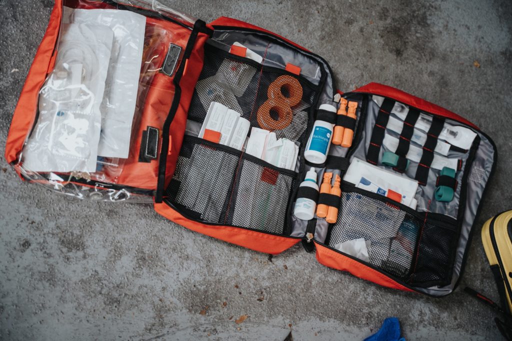 A well-stocked first aid kit for immediate medical attention during security tasks.