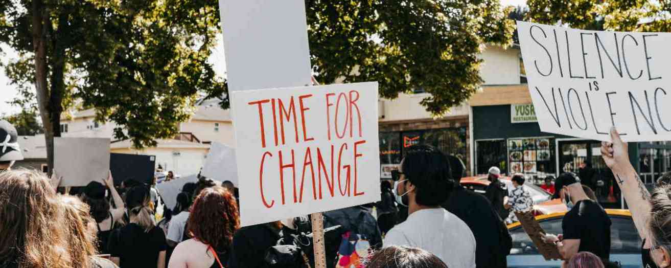 a crowd at a protest in the UK