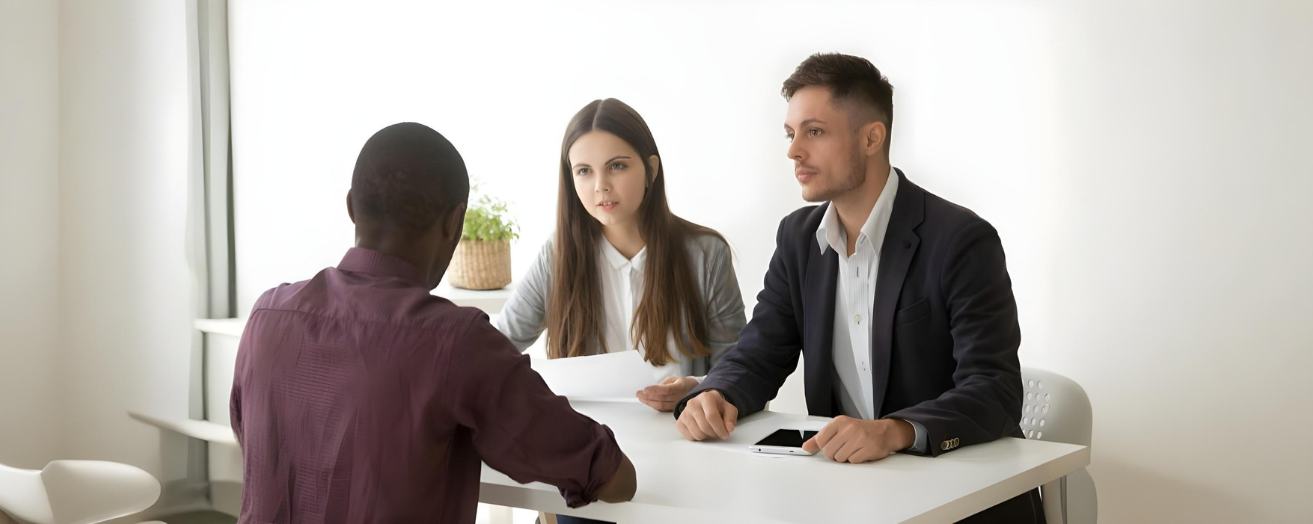a candidate being interviewed by recruiters and answering security interview questions