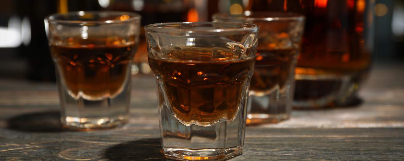 close up of two shot glasses