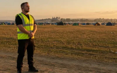 a security officer at a countryside festival