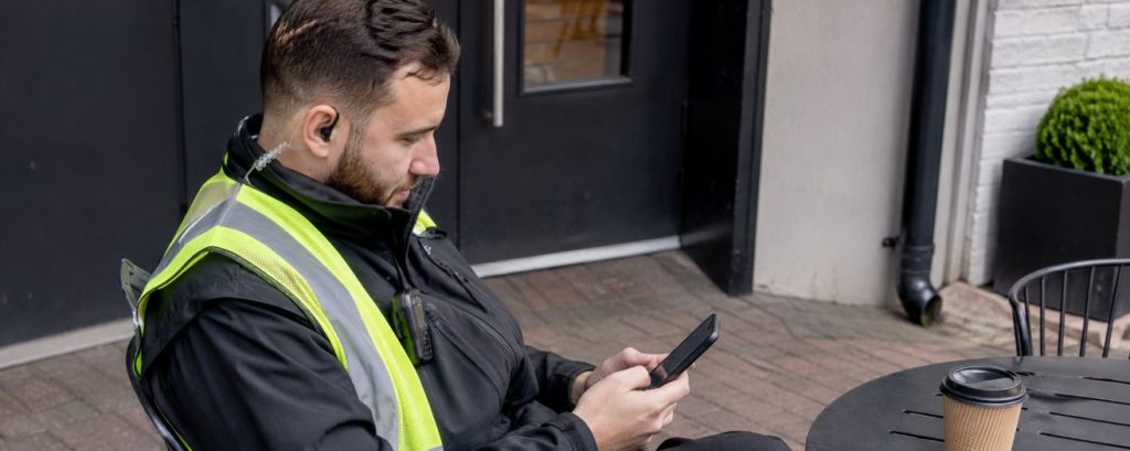 a security officer reading about SIA licence revocations and right to work